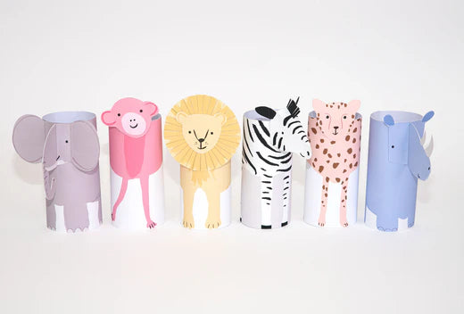 Row of colorful paper safari animal figures including elephant, monkey, lion, zebra, leopard, and hippo.