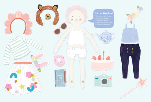 Scattered Matilda paper doll pieces and outfits on a pale blue background