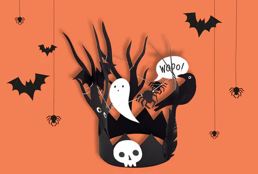Orange backdrop with a black Halloween crown adorned with white ghosts and bats