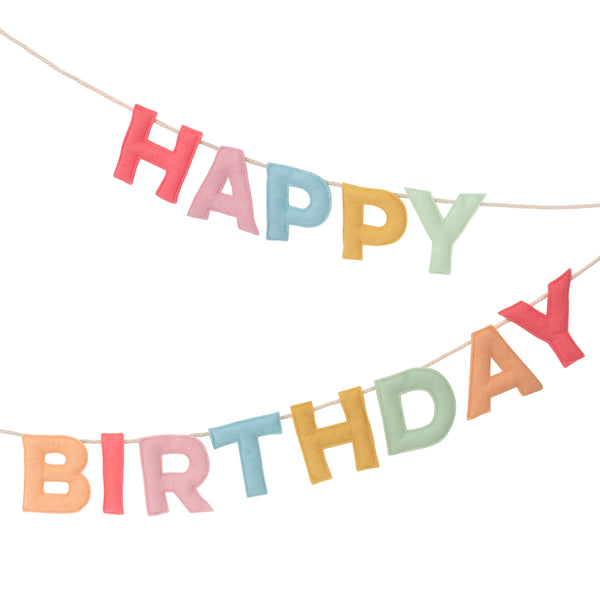 Add a rainbow of colour to your birthday party supplies with a colourful felt garland, paper tablecloth and bright birthday cake candles.  Image2