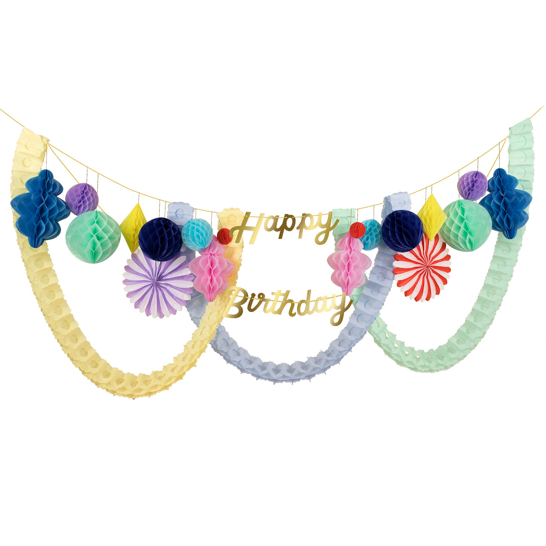 Our honeycomb garland is the perfect party garland for a birthday party decoration.
