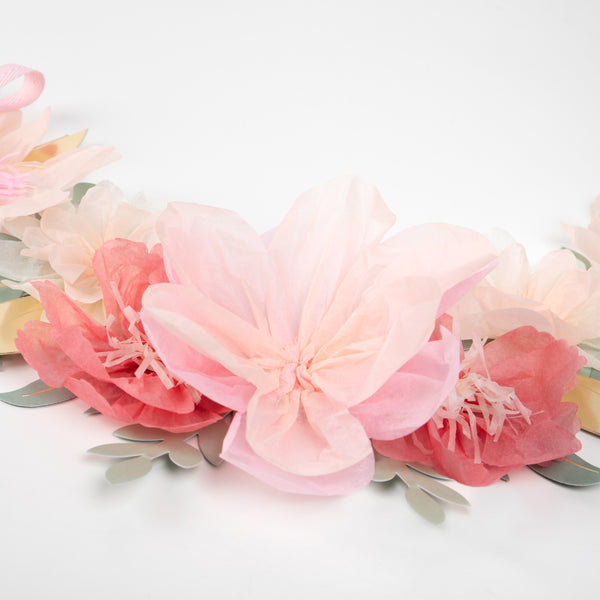 Beautiful pastel plates, cups, napkins, floral garland, and a centrepiece to display macarons.  Image4