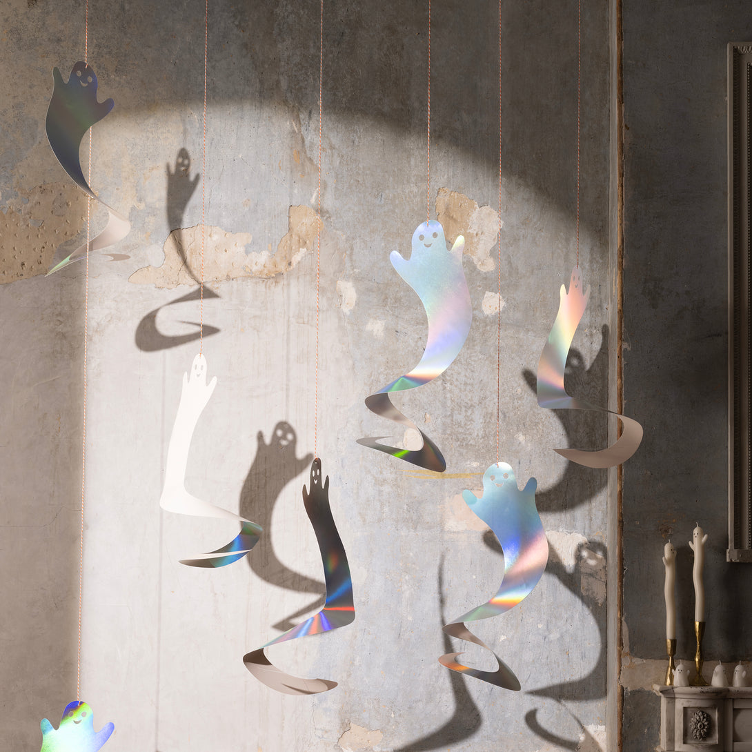 Our ghost decorations, with silver holographic foil, are perfect to add to your Halloween hanging decorations, designed to spin for great effect. Image2