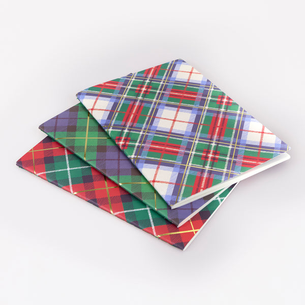 Our notebook set features 3 softcover notebooks with tartan designs in Christmas colours, perfect for someone who loves to write. Image3