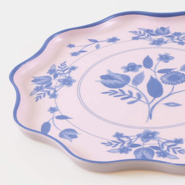 Our large reusable plates, made from practical melamine, come in four pastel shades with a cobalt blue botanical print transfer. Image2