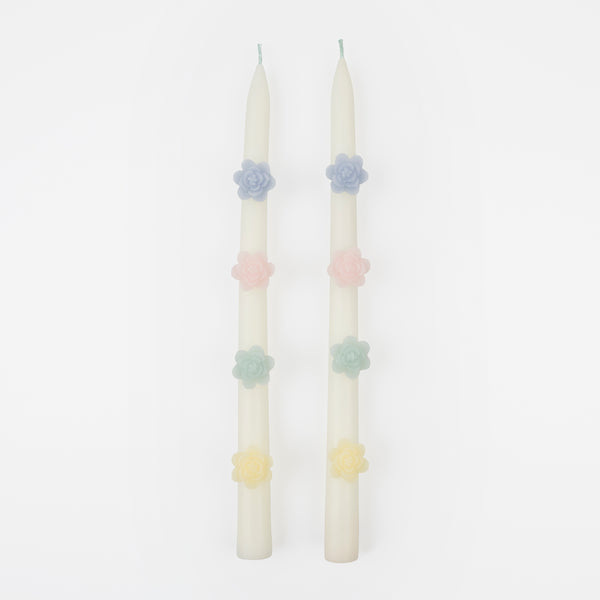 Our decorative candles are an elegant taper shape with 3D wax flowers.