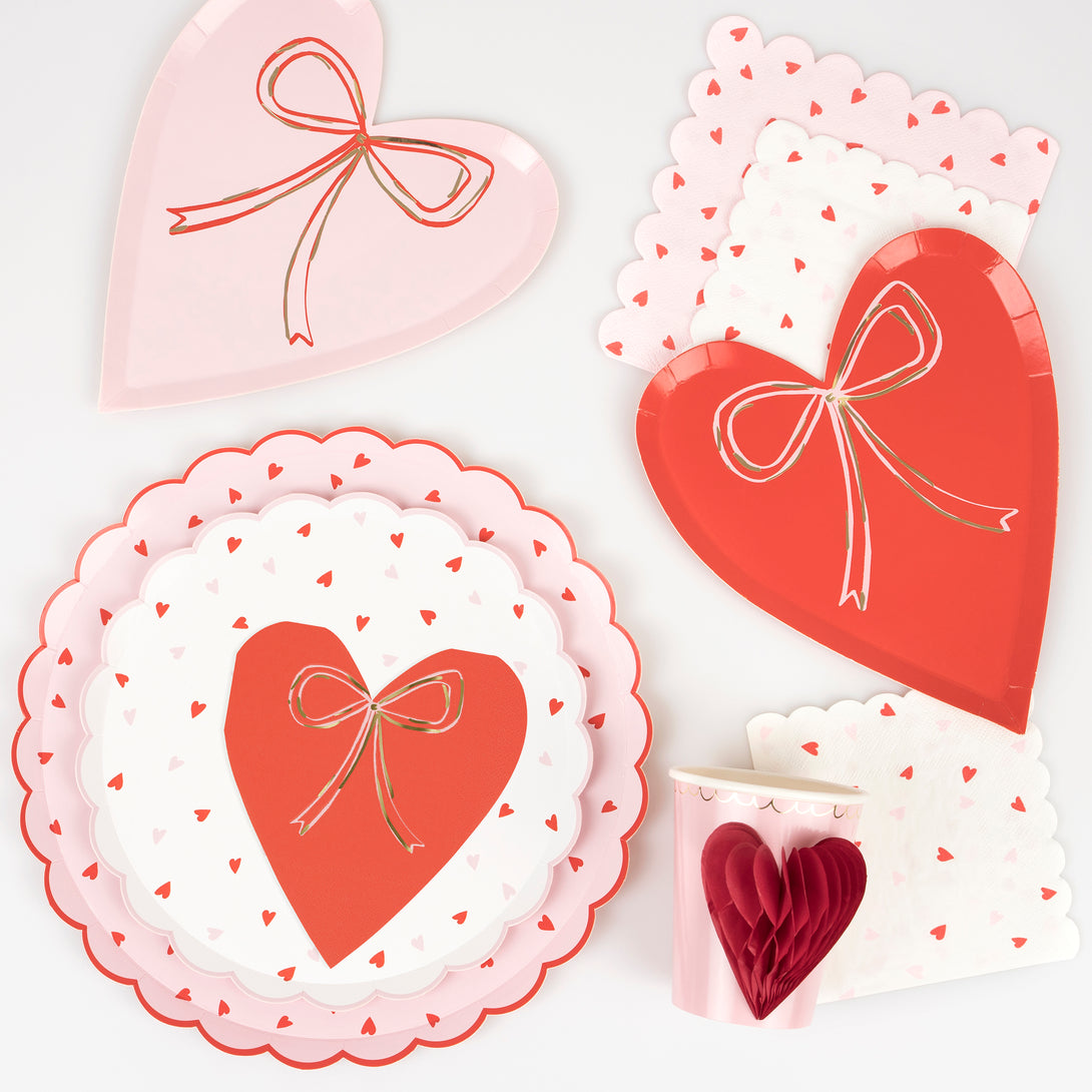 Our party napkins, crafted in the shape of hearts, featuring pink and red colours and fashionable bows.