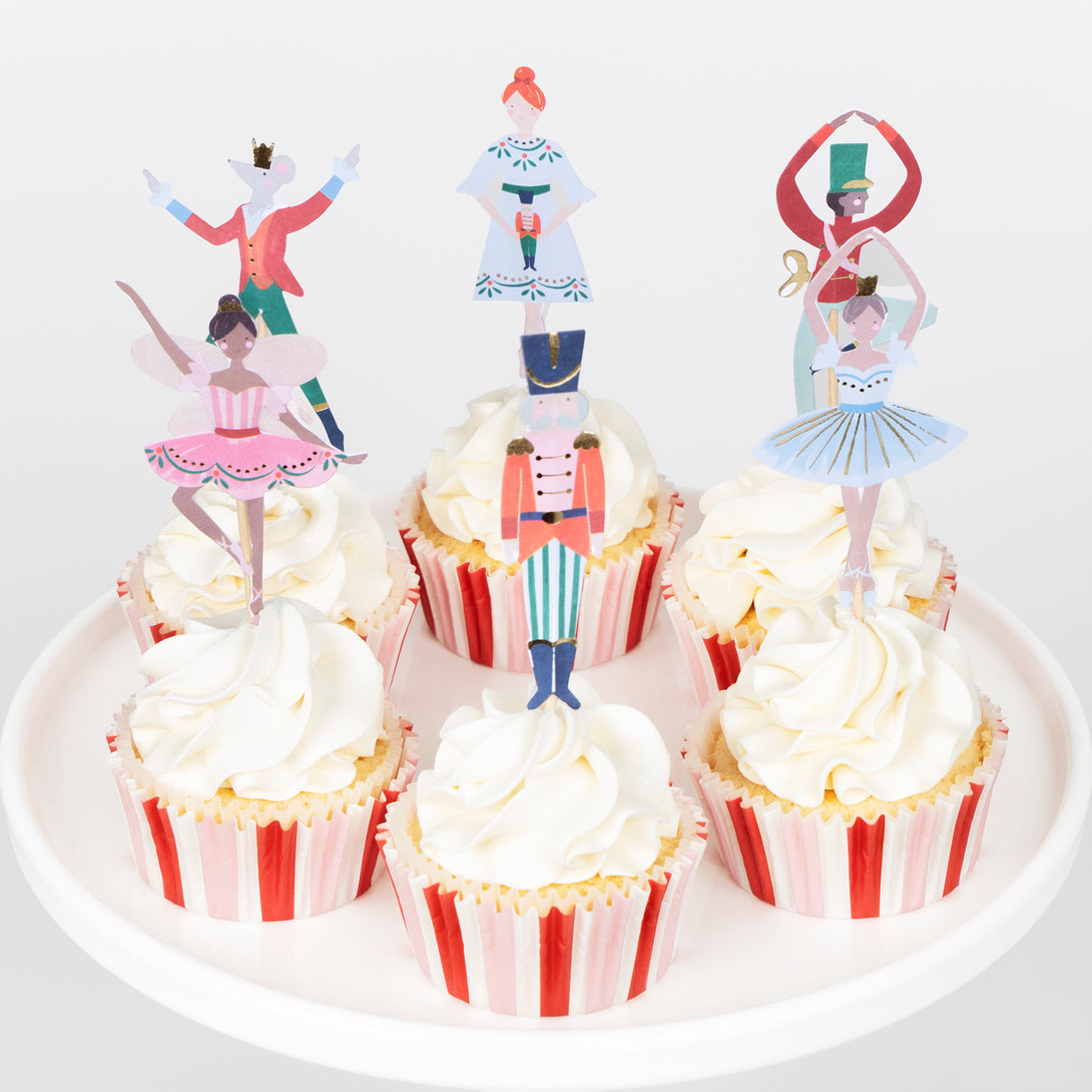 Our cupcake kit features classic Nutcracker character cake toppers and striped cupcake cases, ideal for Christmas treats. Image4