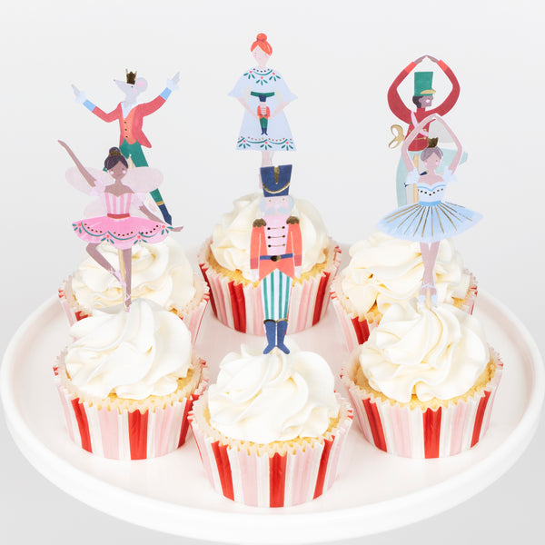 Our cupcake kit features classic Nutcracker character cake toppers and striped cupcake cases, ideal for Christmas treats. Image4