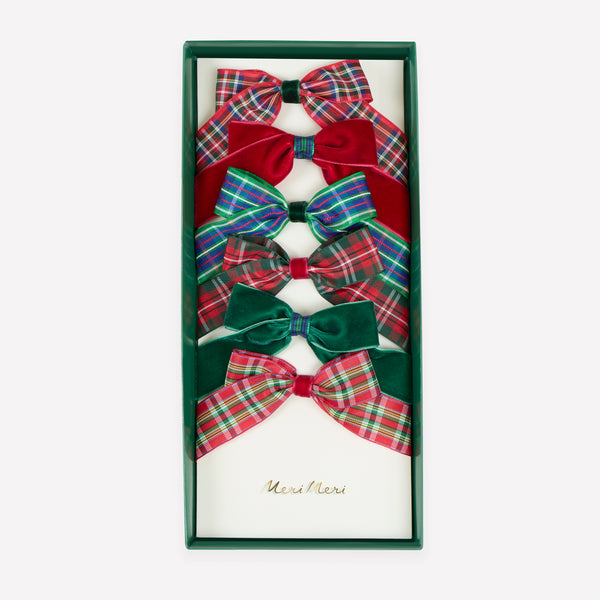 Our Christmas hair clips set features velvet and tartan ribbon bows in festive colours, perfect to pop into party bags or gift. Image1
