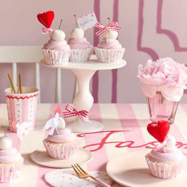 Your Valentine's cupcakes will look super sweet with our pink and red cake toppers and cupcake cases. Image2