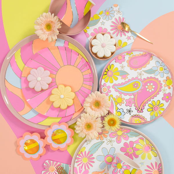 Our 3-ply paper napkins, in a large size, features a groovy vibrant flower power design, ideal for 70s parties or any fun celebration. Image2