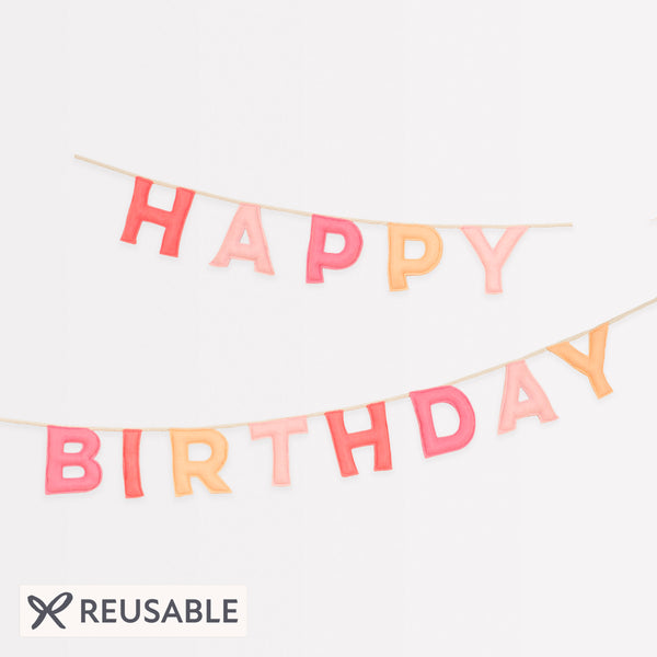Our happy birthday garland has felt letters in peach and pink tones, ideal to reuse year after year. Image1