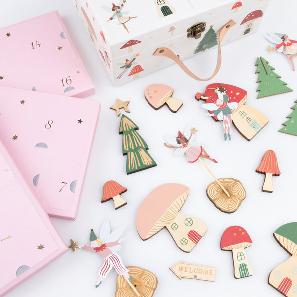 Our wooden advent calendar contains a woodland scene complete with paper fairies, presented in a suitcase, a fun interactive gift Image4