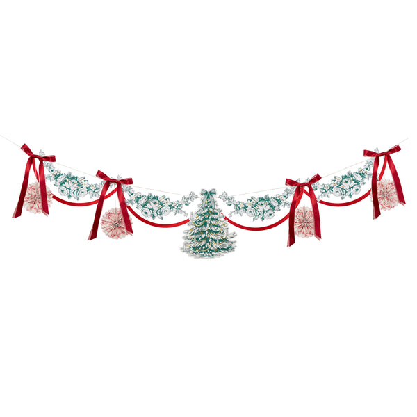 Our Christmas garland has paper foliage, pinwheels and a decorative tree, all with an elegant Toile de Jouy print, topped with ribbon bows. Image3