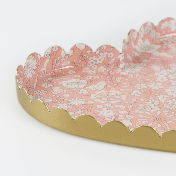 Our jewellery tray is made from enamelled metal, in a heart shape, with a pretty pink and white Liberty floral print design. Image3