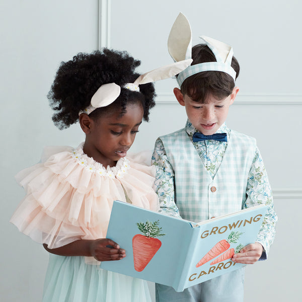Our Easter outfit of bunny ears and a gingham waistcoat with pompom tail is gorgeous. Image2