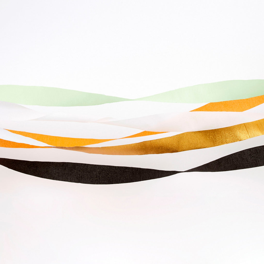 Decorate your Halloween party with these colourful crepe paper streamers.