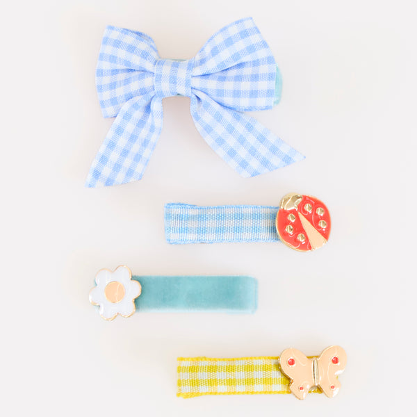 Our hair clip set features 8 designs, with enamel butterflies, flowers and ladybugs, and gingham and velvet ribbons, such stylish accessories. Image3