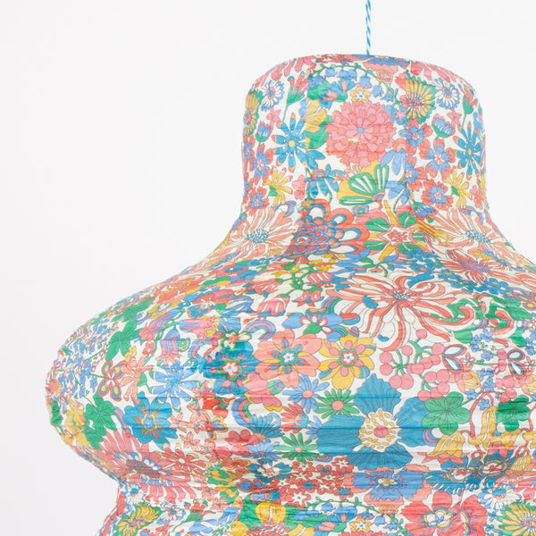 Our paper lantern set has a set of three, in a wavy, round and oval shape, each with a different Liberty floral print design, great for parties. Image3