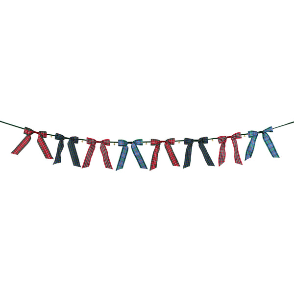 Our statement Christmas garland features large tartan bows with tinkling bells, perfect for hanging wherever you want seasonal sophistication. Image4