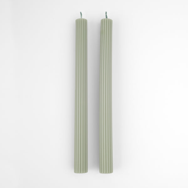 Our table candles, long with ridged details, are in a gorgeous green shade. Image4