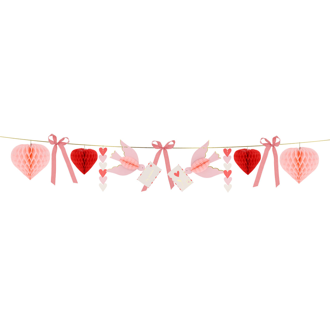 Our Valentine's decoration is a beautiful Valentine's garland with 3D hearts, love birds and gingham bows, all in pretty pink and red tones. Image3