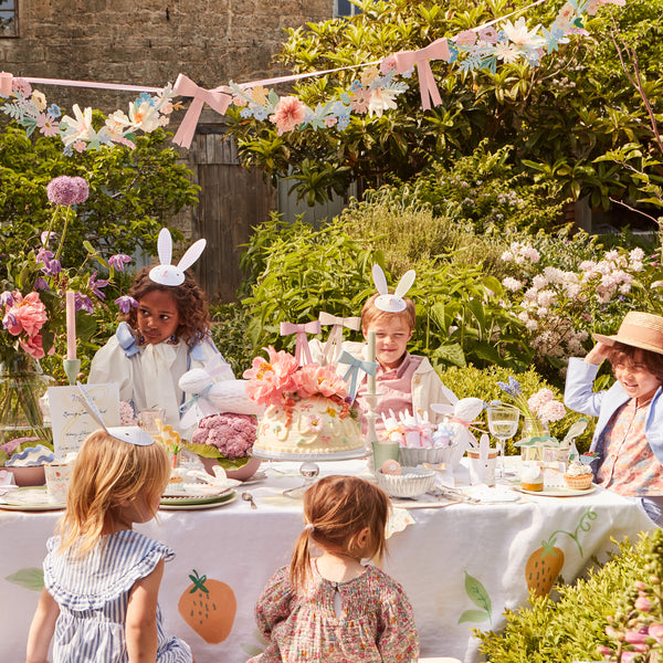 Our paper garland, featuring flowers and bows, is the perfect baby shower garland or Easter garland. Image2