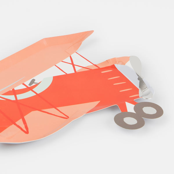 Kids who love airplanes will love our airplane party set which includes an airplane garland, plates, napkins and cups.  Image6