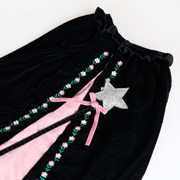 Our witch costume, made from luxurious black velvet with an embroidered floral design, features a cape, hat and a star topped wand. Image2