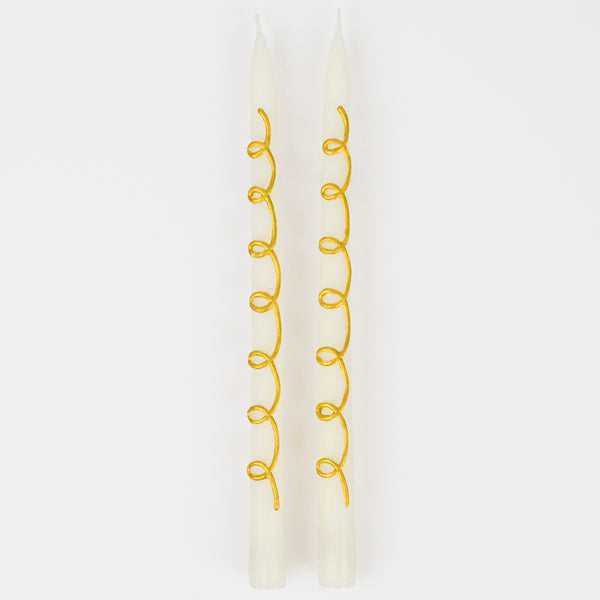 Our taper candles, with a gold swirl design, are perfect as Christmas decorative candles.