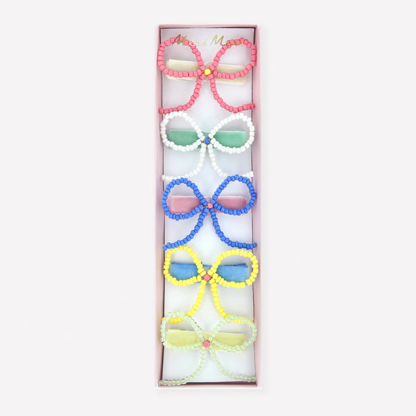 Our bow hair clips are made with pretty beads and velvet-covered clips for a really stylish hair accessory. Image1
