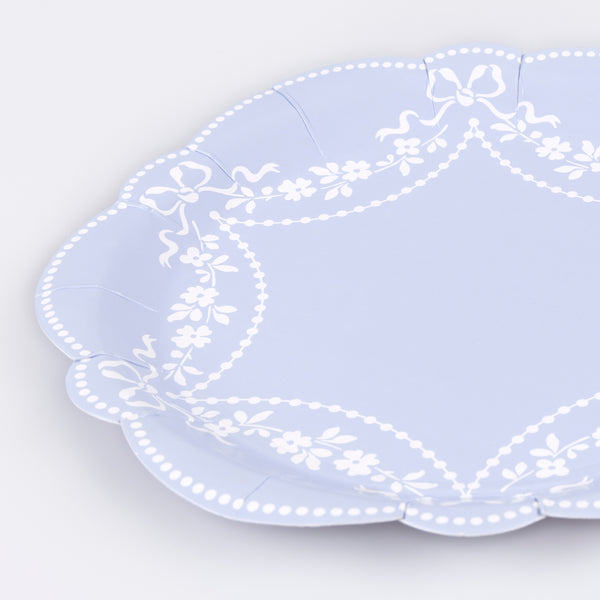 Our paper plates, made in a cornflower blue shade with white ornate patterns, are ideal as baby shower plates or for any special meal. Image3