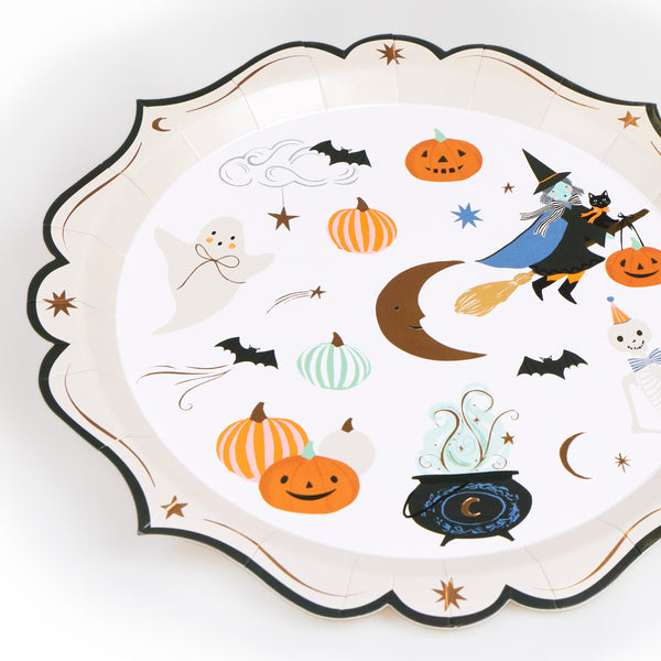 Our Halloween plates, made from paper and in a small plate size, feature happy characters in seasonal colours with pops of copper foil. Image3