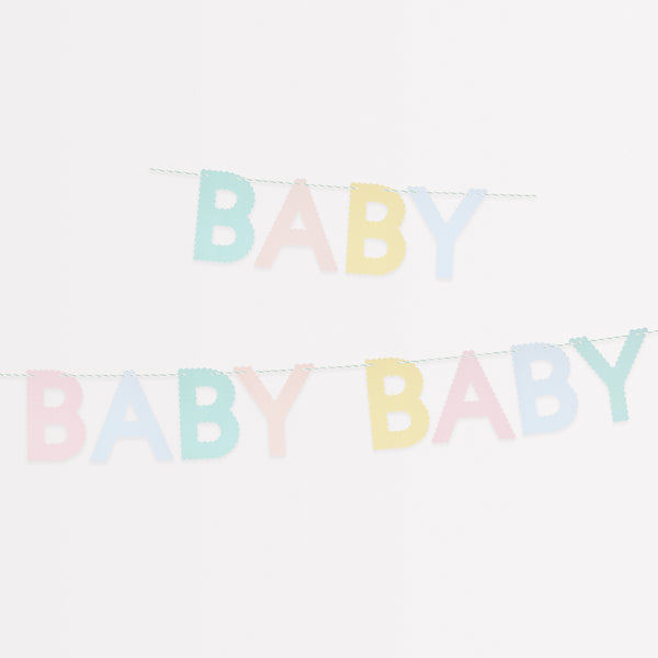 Our pastel paper garland, with the words baby, baby, baby, is ideal for your baby shower.