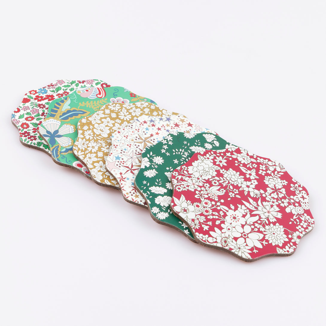 Our Christmas coasters, made from a laminated wood composite, feature elegant Liberty print designs, perfect as a host gift. Image4