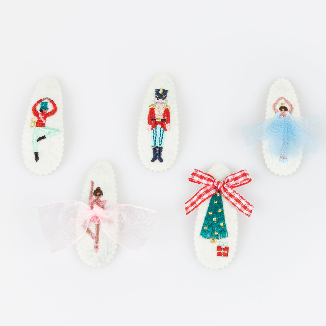Our felt Christmas hair clips feature iconic Nutcracker characters, embroidered with embellishments, for a stylish look. Image4