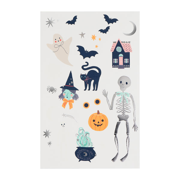 Our Halloween temporary tattoos feature classic icons and shimmering silver foil for a sparkly look, great for dress-up fun. For ages 3+. Image2