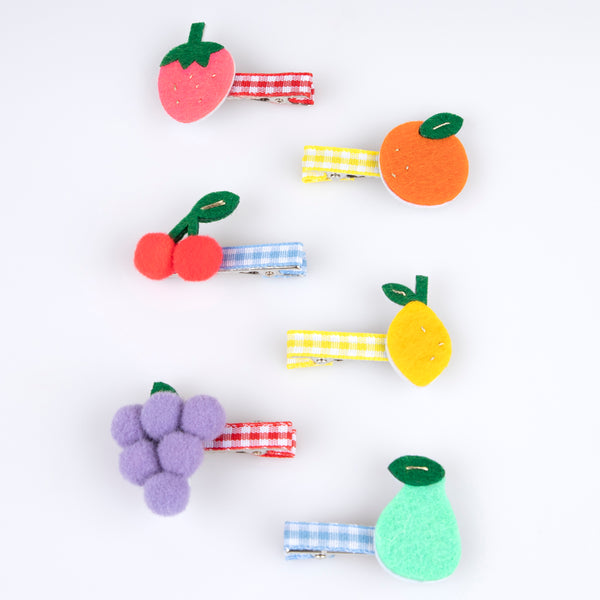 Our fruit hair clips are made from felt with fun pompoms and gingham ribbons for a really fabulous summery effect. Image3