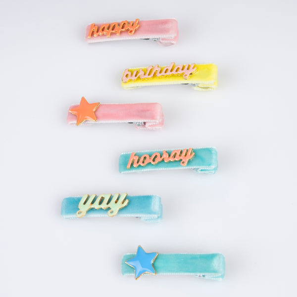 Our hair accessories for kids are charming birthday candle shaped clips with velvet ribbon and enamel details. Image3