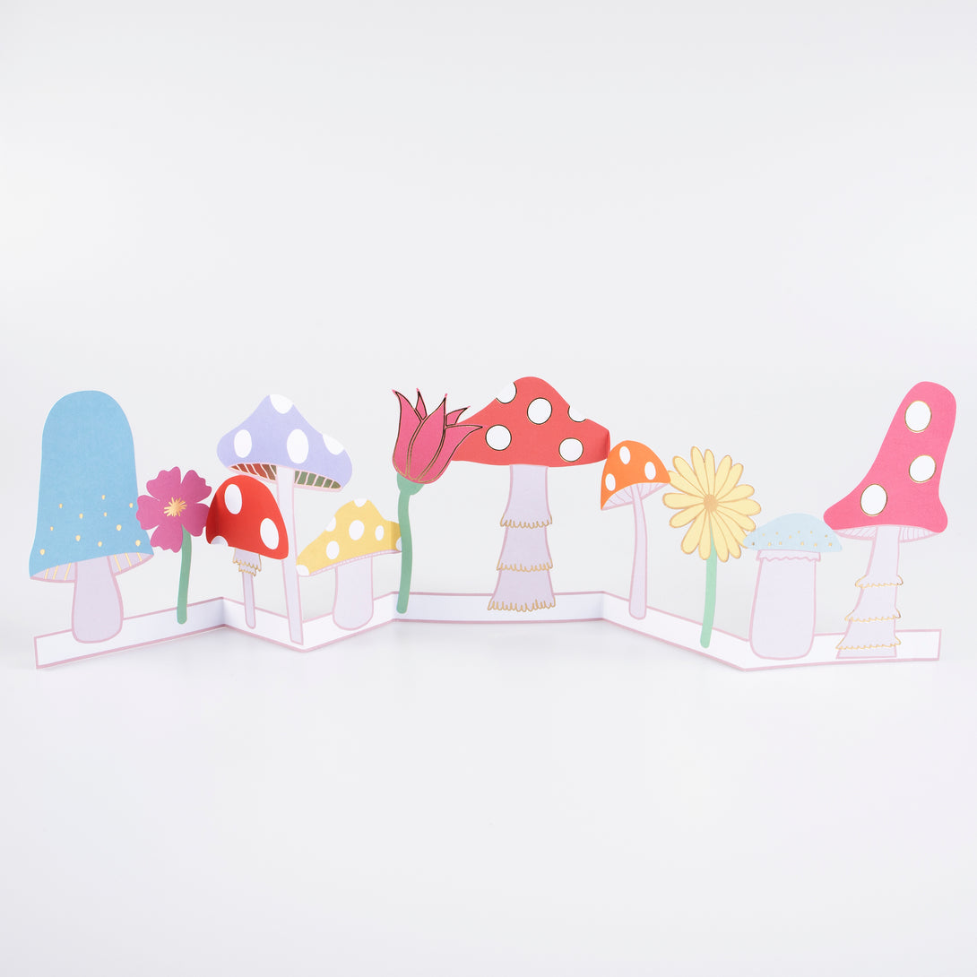 Our mushroom birthday card is a concertina card, so is a fun mantel decoration too.