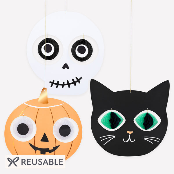 Our Halloween hanging decorations feature a skull, cat and Halloween pumpkin, with happy faces and 3D dangling eyeball details. Image1