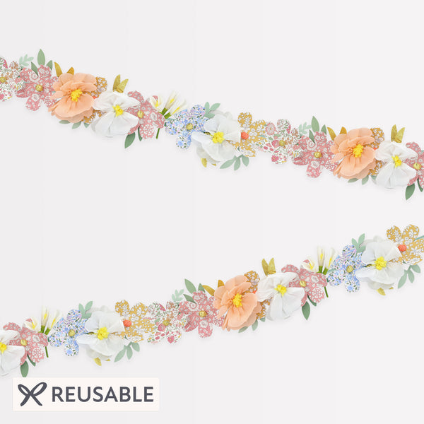 Our floral garland features pretty Liberty prints, making it wonderful for home decoration or as a baby shower decoration. Image1