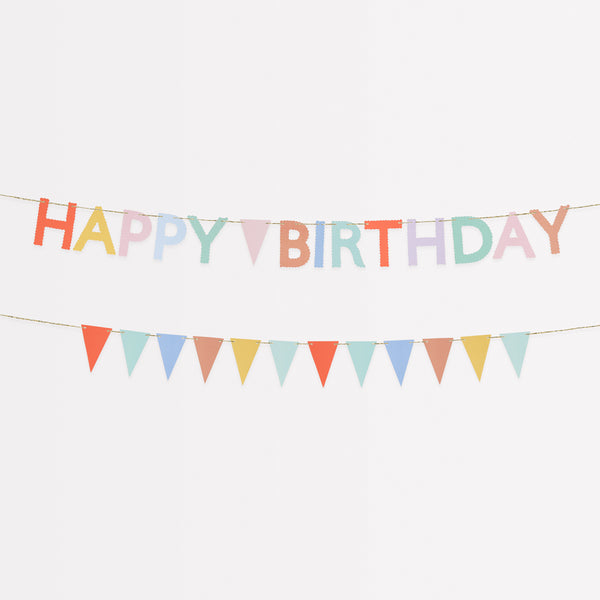 Our birthday garland set includes one that spells out Happy Birthday and another with flag pennants, in bright colours.