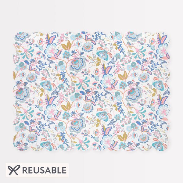 Our large placemat is crafted in a rectangular shape with a scalloped edge, pretty floral Liberty print design, cork back and laminated finish. Image1