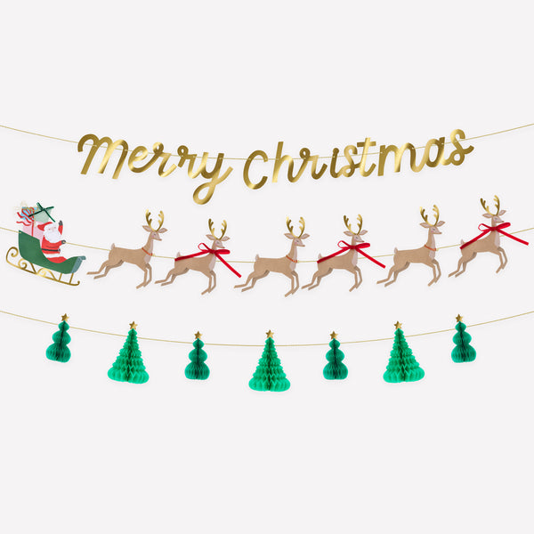Our special Christmas garland set includes 3 garlands featuring Santa and his reindeer, 3D Christmas trees and a Merry Christmas message. Image1