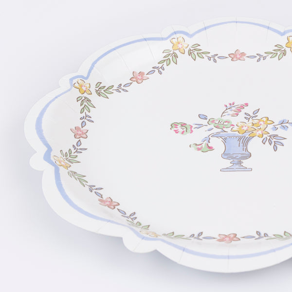 Our paper side plates, feature a rococo inspired floral design, ideal as statement tableware for an elegant occasion. Image2