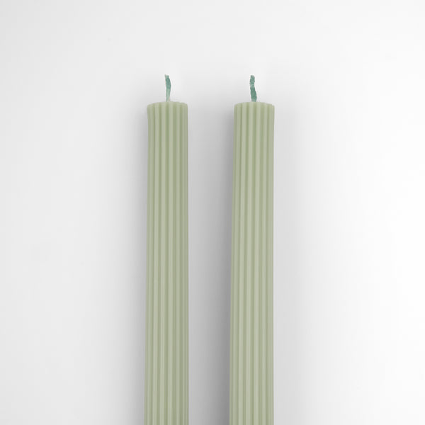 Our table candles, long with ridged details, are in a gorgeous green shade. Image3
