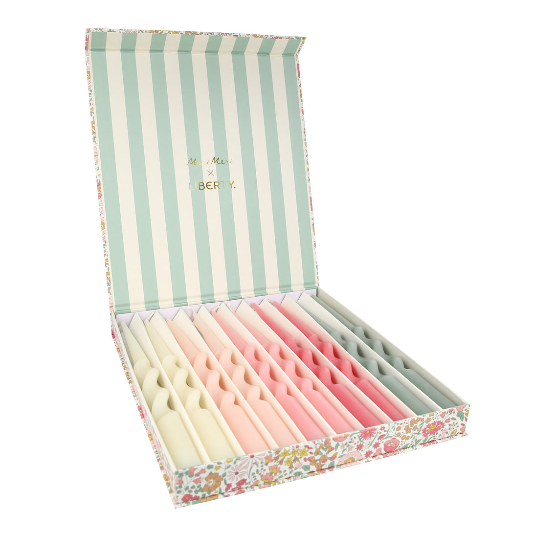 Our candle gift box includes 10 table candles in 5 soft colours, all beautifully presented in a Liberty print floral box.