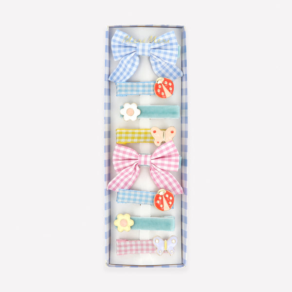 Our hair clip set features 8 designs, with enamel butterflies, flowers and ladybugs, and gingham and velvet ribbons, such stylish accessories. Image1